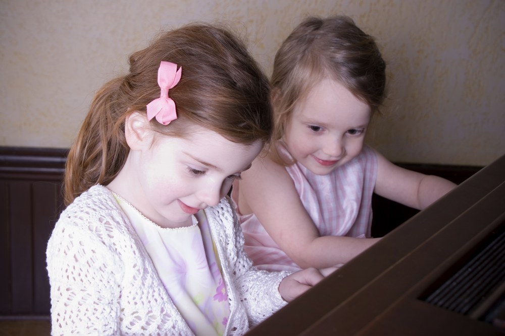 Sister play piano